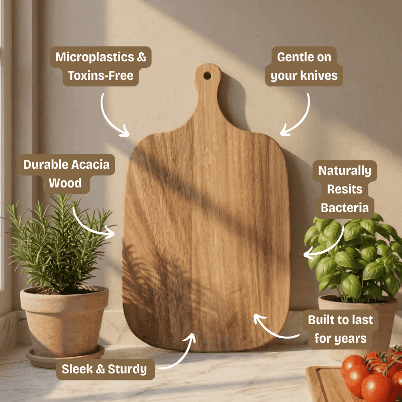 Wooden cutting board with text highlighting its features, placed on a wooden surface with plants and tomatoes.