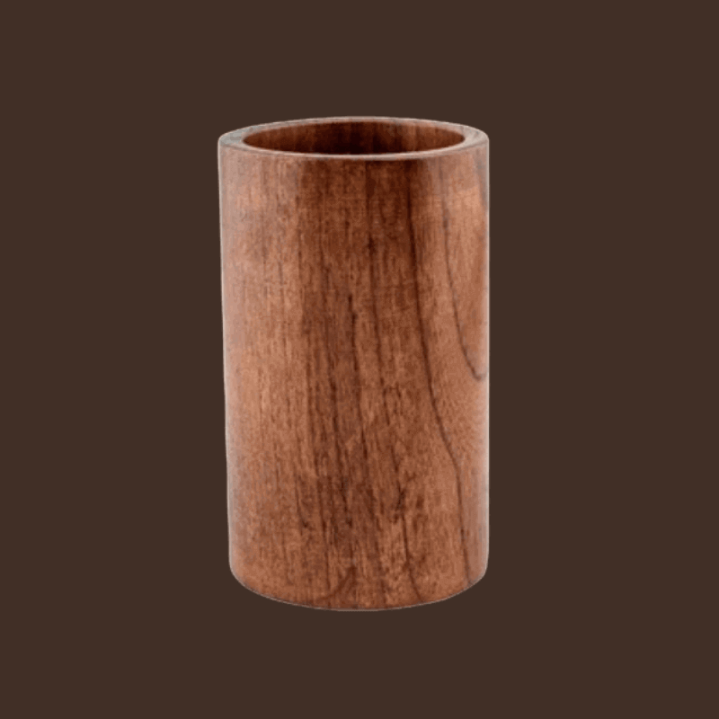 Wooden cup on a brown background