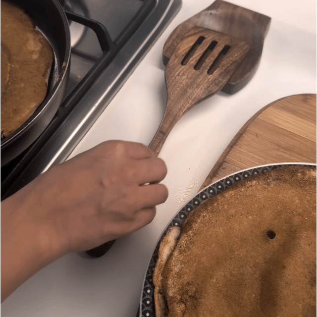 Cooking with teak wood utensil