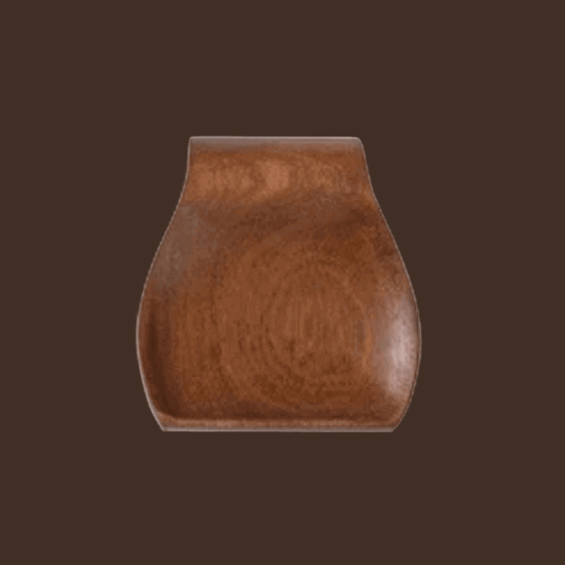 Brown wooden tray on a dark brown background