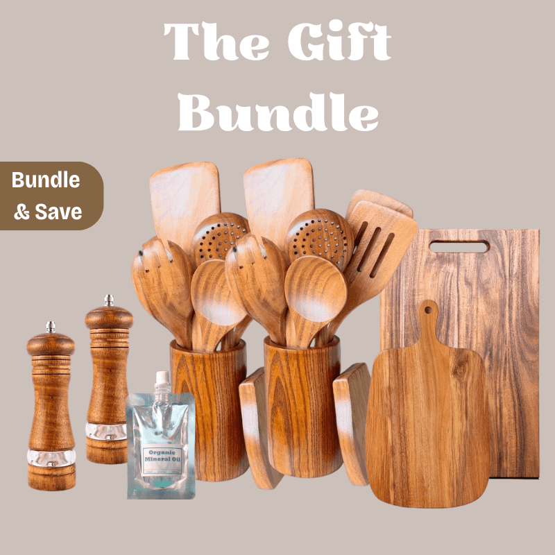 Wooden kitchen utensils and cutting boards with a bottle of olive oil on a beige background.