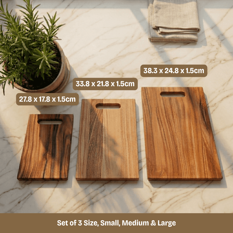 Set of three wooden cutting boards with measurements on a marble surface.